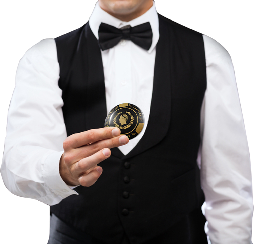 casino dealer holding gambling chip